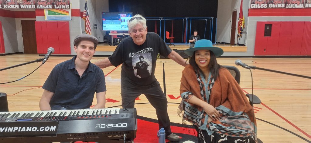 Candace Ivory performs alongside pianist Ben Levin and Campbell Culture Coalition Executive Director Manuel Mesa at Caryville Elementary School on September 25th.