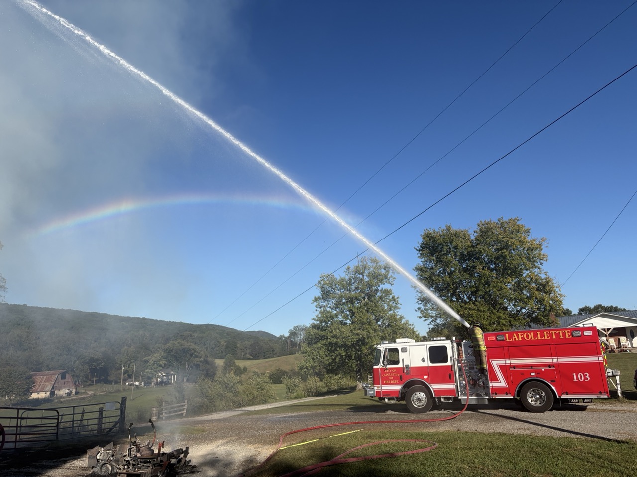 Hay barn and mower a total loss, tool shed saved